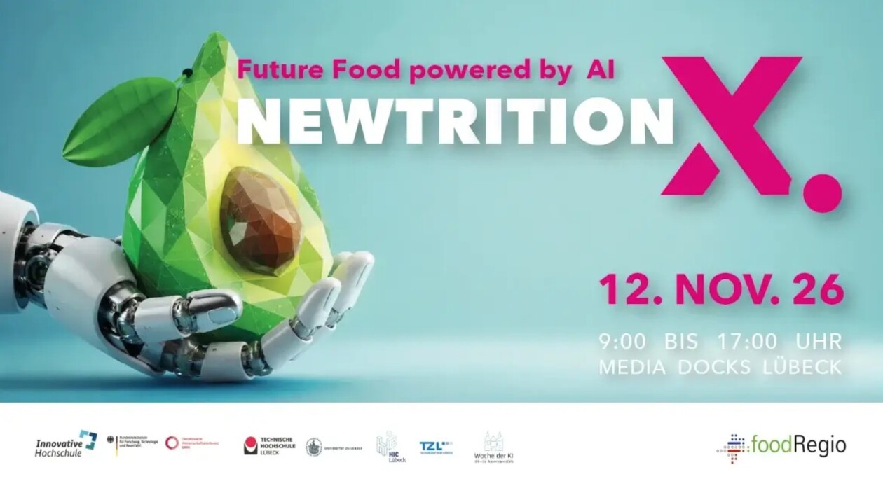 Veranstaltungsbanner zeigt eine digitale, aufgeschnittene Avokado in einer Roboterhand. foodRegia