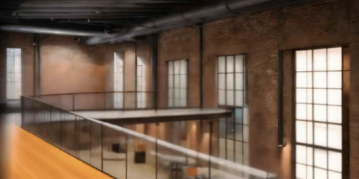 Team Creative Lighthouse Innenansicht einer Halle mit Zwischenebene und Fenstern